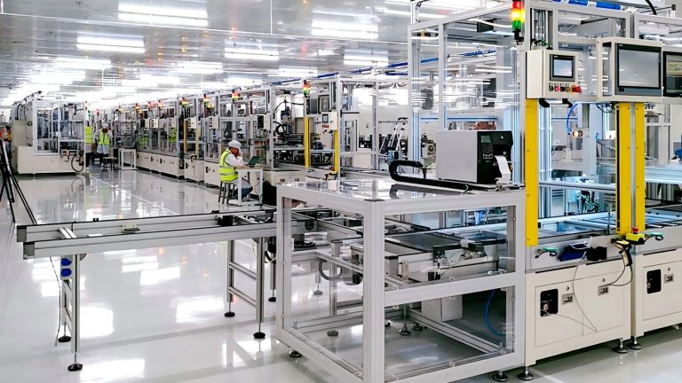 Automated production line with clear acrylic guarding panels in a China fabrication facility