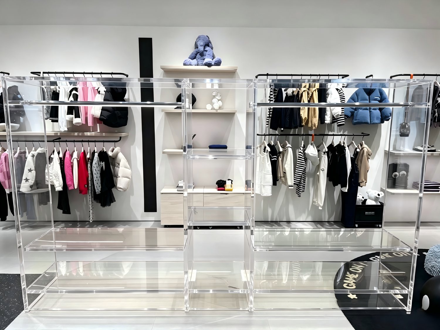 Clear acrylic retail display fixtures and shelving