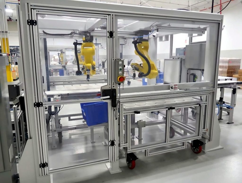 Aluminium-framed acrylic machine guards around a robot cell