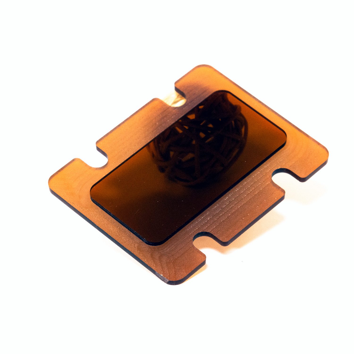 Laser-cut amber acrylic gasket produced from a customer drawing