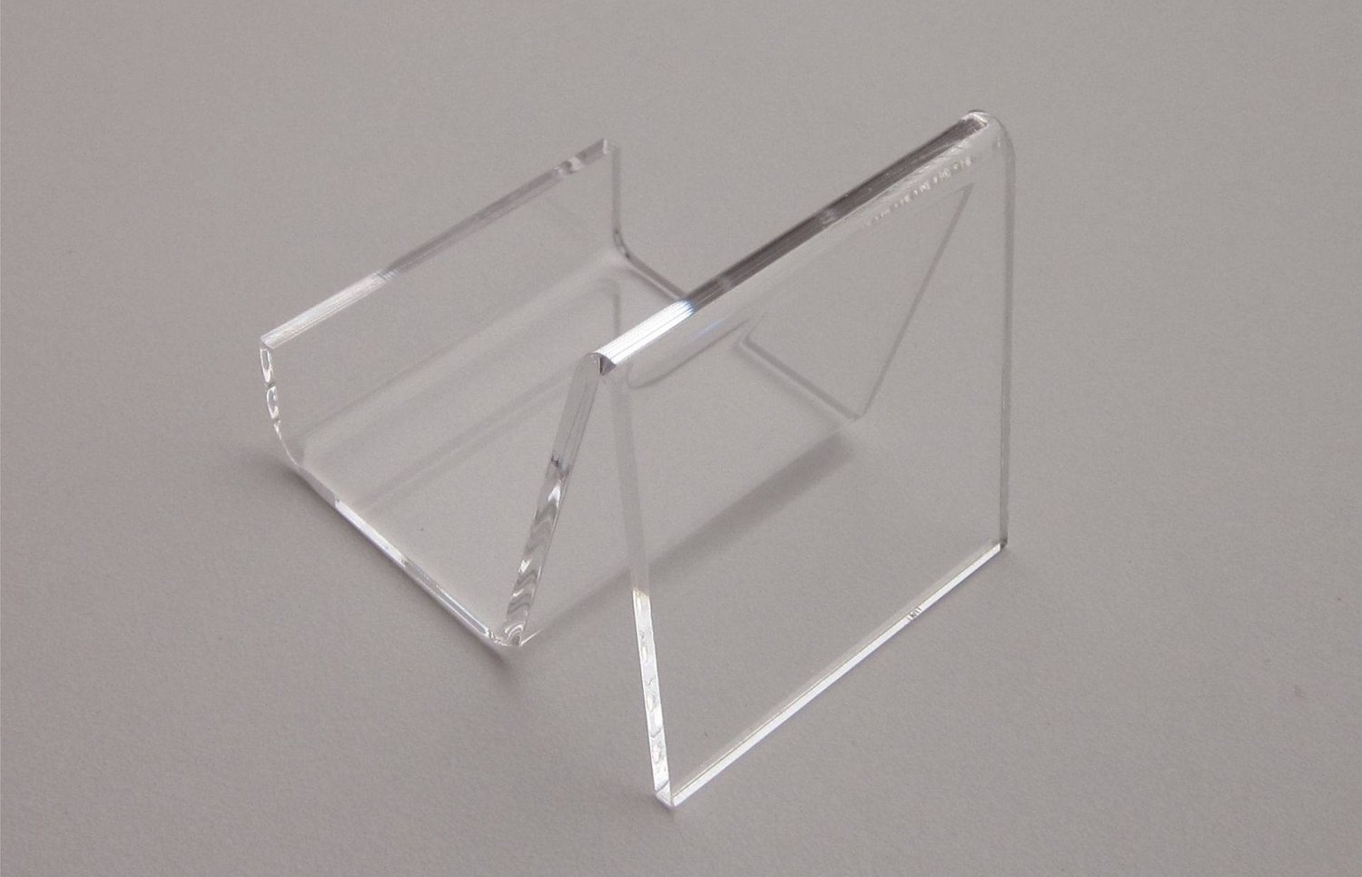 Polished, thermally bent clear acrylic bracket